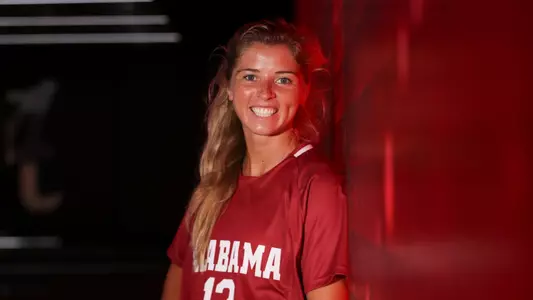 Riley Tanner poses in football tunnel