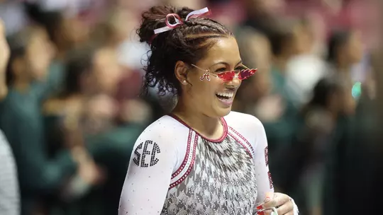 Makarri Doggette wearing pink, heart-shaped glasses