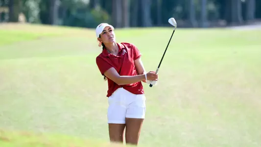 Kynadie Adams stares down a shot from the fairway