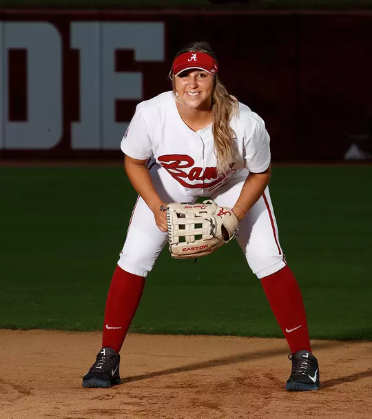 Ashley Prange bent over with knees bent