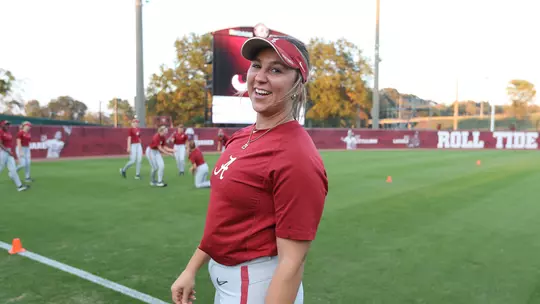 Ashley Prange smiling at the camera at practice