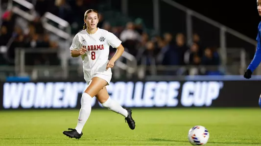 Felicia Knox at the college cup dribbling the ball