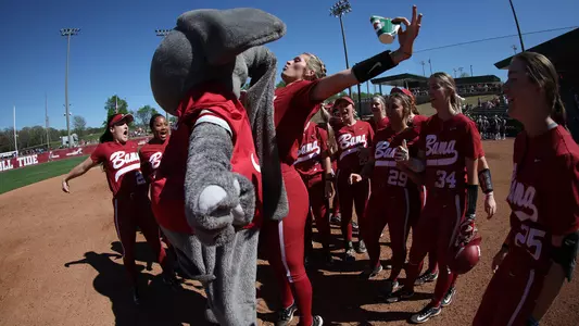 Montana Fouts chest bumps Big Al after throwing a perfect game vs. Longwood (March 5, 2023)