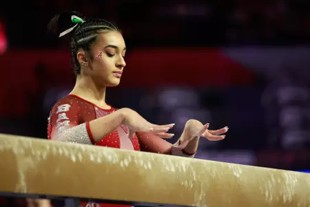 Luisa Blanco prepares for her balance beam routine