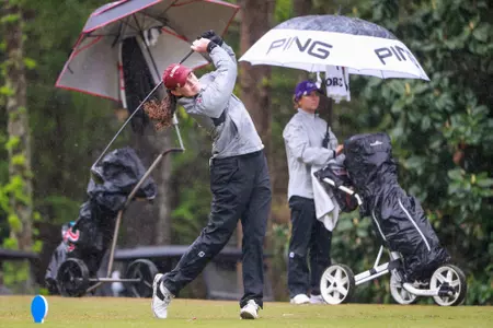Alabama Golfer Sarah Edwards tees off in the rain during the SEC Championship at Greystone Country Club in Birmingham, AL on Thursday, Apr 13, 2023.