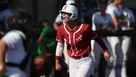 Bailey Dowling celebrates after hitting a home run at Marshall (April 18, 2023)