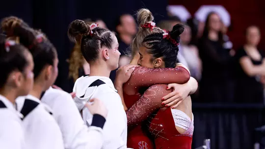 Luisa Blanco hugging one of her teammates