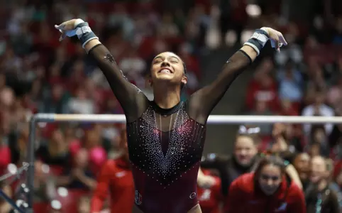 Luisa Blanco competes on the uneven bars