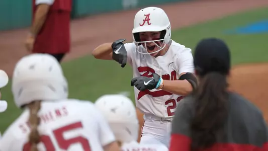 Kali Heivilin celebrating heading home after a home run vs. LIU in NCAA Regionals (May 19, 2023)