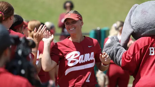 Bailey Dowling high fives her teammates during starting lineup introductions vs. LSU (April 29, 2023)