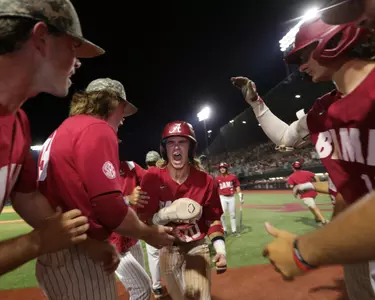 \Alabama baseball player Jim Jarvis (10) celebrates against Troy at Sewell-Thomas Stadium in Tuscaloosa, AL on Saturday, Jun 3, 2023.