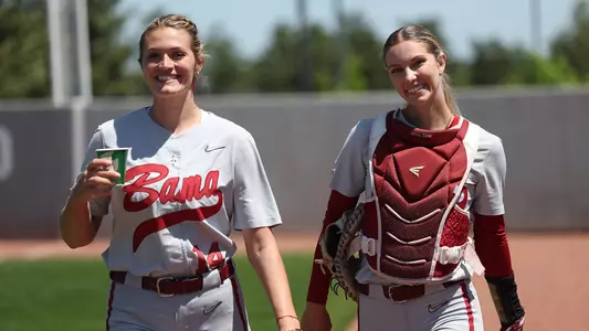 Montana Fouts and Ally Shipman walk together from the bullpen vs. Mississippi State (April 16, 2023)