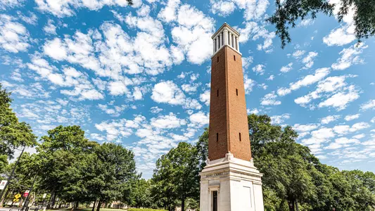 Denny Chimes with blue sky in background