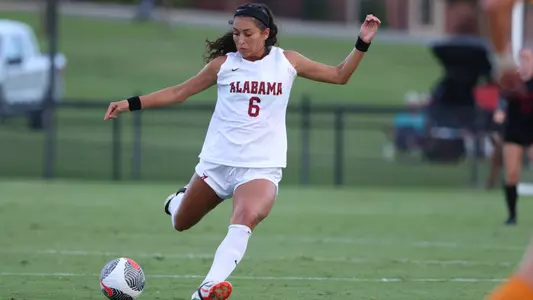 Sasha Pickard kicks the ball