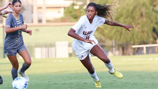 Alabama soccer player Gianna Paul (14) fighting for the ball against UAB at PNC Field in Birmingham, AL on Sunday, Aug 20, 2023.