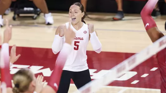 Sydney Gholson celebrates Alabama scoring a point.