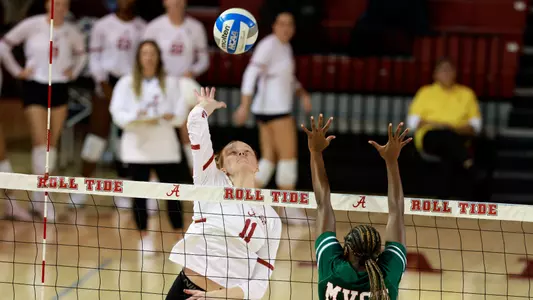 Kaleigh Palmer hits the ball.