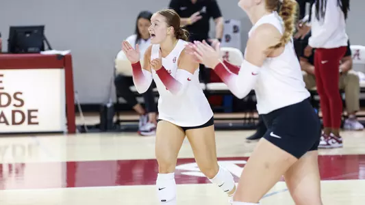 Vic Schmer celebrates Alabama scoring a point.