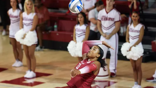Alyiah Wells hits the ball.