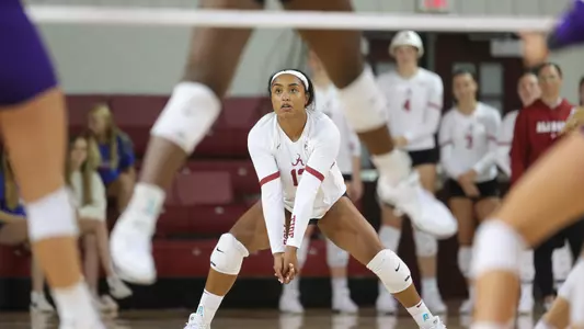 Alyiah Wells prepares to hit the ball.