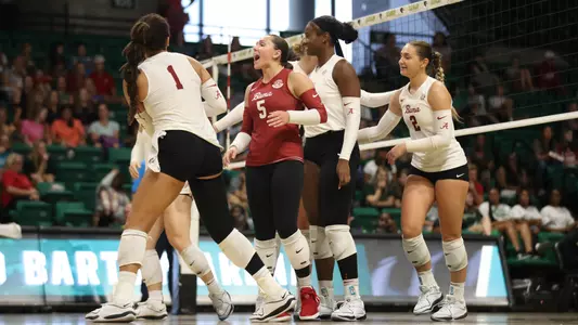 Sydney Gholson celebrates with her teammates vs. UAB (Sept. 10, 2023)