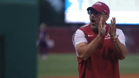 Alabama softball head coach Patrick Murphy clapping vs. Northwestern (May 26, 2023)