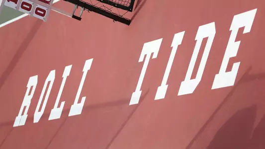 Roll Tide printed on the court