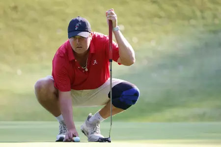 Alabama golfer Canon Claycomb lines up a putt during SEC Match Play Hosted by Jerry Pate at Country Club of Birmingham in Biurmingham, AL on Wednesday, Sep 27, 2023.