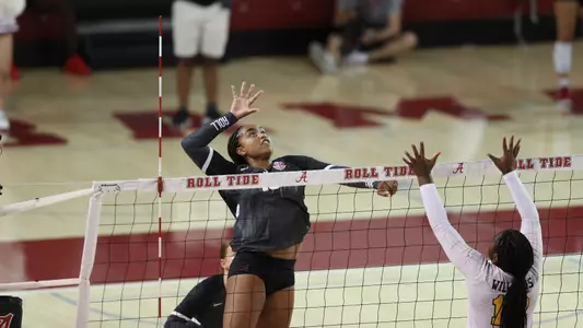 Alyiah Wells goes up for a hit.