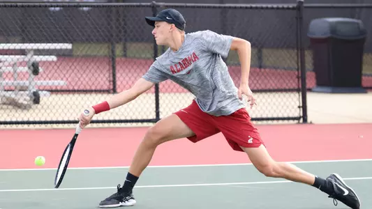 Alabama men's tennis player Andrii Zimnokh in action against UTR TuscaBama at The University of Alabama Tennis Stadium in Tuscaloosa, AL on Monday, Nov 13, 2023.
