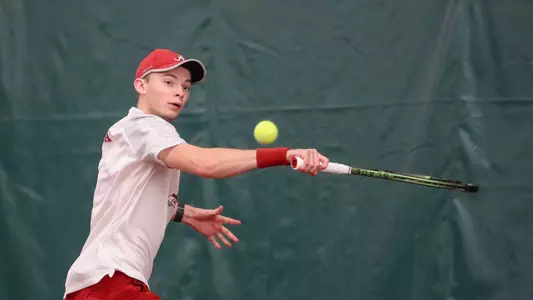 Roan Jones hits the ball
