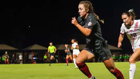 Kate Henderson runs after the ball