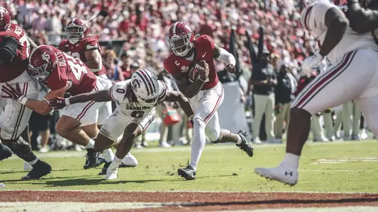 Jalen Milroe running the ball