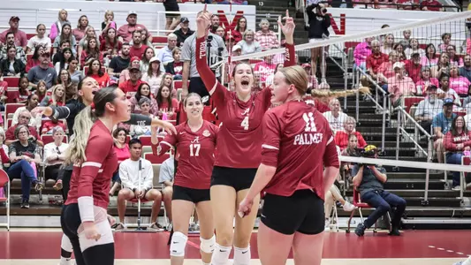 Alabama volleyball players celebrate after a point at Arkansas (Oct. 13, 2024)
