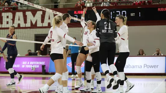 Alabama volleyball players celebrate after a point vs. Auburn (Oct. 16, 2024)