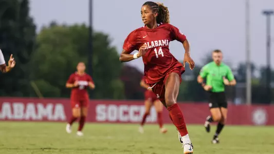 Gianna Paul runs down the field