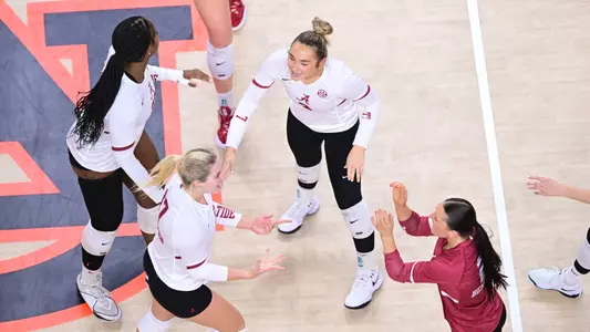 Alabama volleyball players celebrate at Auburn (Sept. 29, 2024)