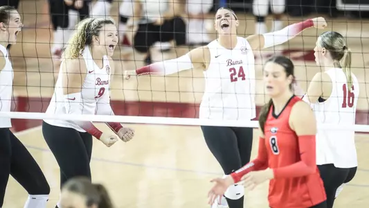 Alabama volleyball players celebrate during a win over Georgia (Oct. 6, 2024)