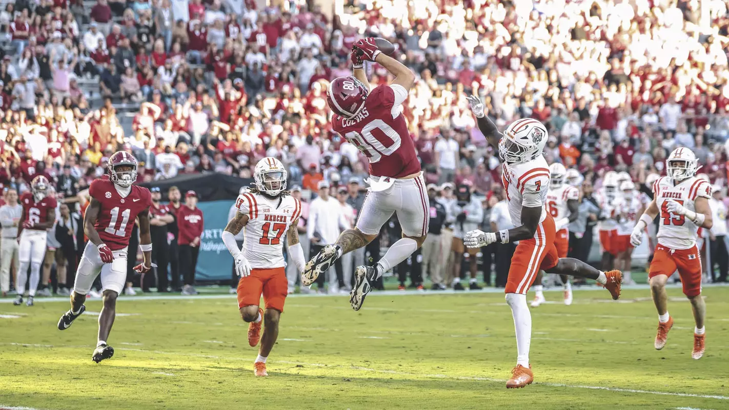 Josh Cuevas catching the football against Mercer