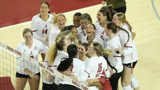 Alabama volleyball players celebrating after a win vs. Mississippi State (Nov. 15, 2024)