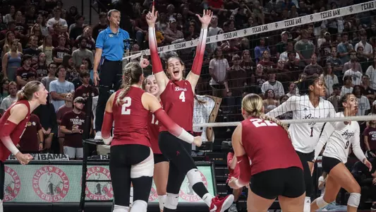 Jordyn Towns (4) celebrates with teammates after a point vs. Texas A&M (Nov. 1, 2024)