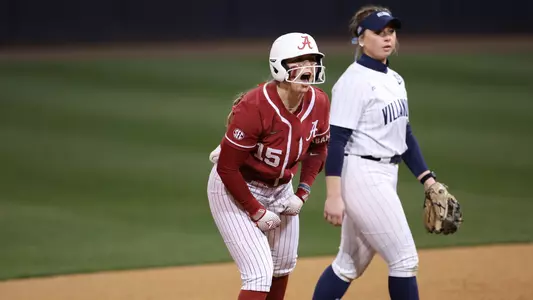 Alabama softball player Kendal Clark stands on base.
