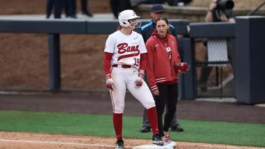 Alabama softball player Kendal Clark stands on first base.