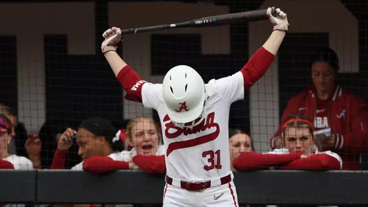 Kenleigh Cahalan (31) stretches before hitting against Longwood (Feb. 9, 2024)