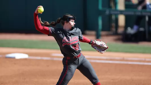 Alabama softball player Alea Johnson pitches against Southern Indiana.