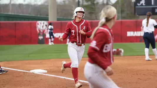 Alabama softball player Bailey Dowling runs home for her first home run of the season.