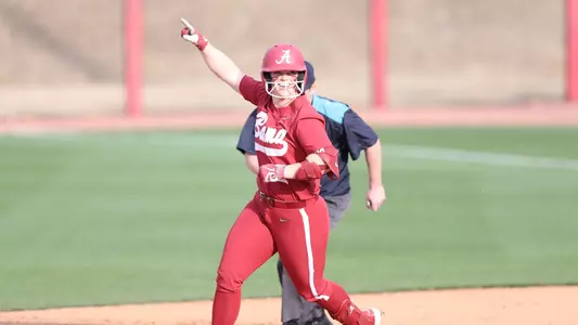 Alabama softball player Emma Broadfoot runs after hitting a three-run home run.