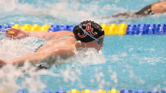 Gaby Van Brunt swimming butterfly