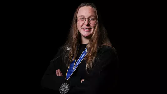 Avery Wiseman medal and black background