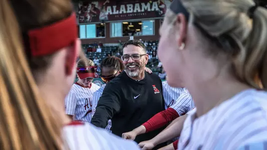 Head softball coach Patrick Murphy breaks down the pregame huddle before playing Florida (March 11, 2024)